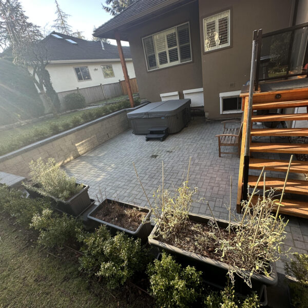 white rock retaining wall and patio