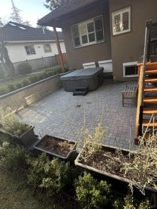 white rock retaining wall and patio