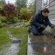 Yard drainage system directing rainwater away from a Lower Mainland BC home and foundation.
